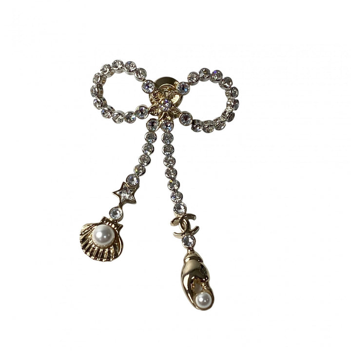 未使用 シャネル CHANEL レディース リボン ココマーク マリンモチーフ ピンブローチ ABE987 I25C