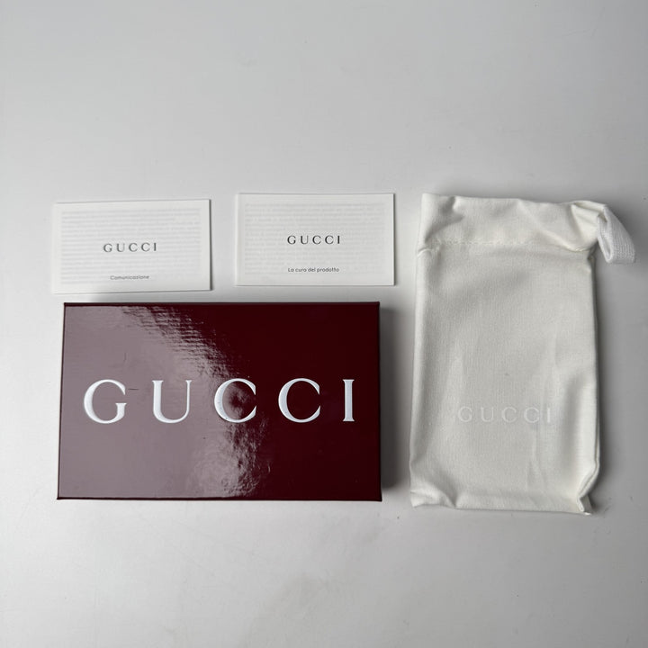 未使用 グッチ GUCCI ロゴマニア フラグメントケース 835073 レディース